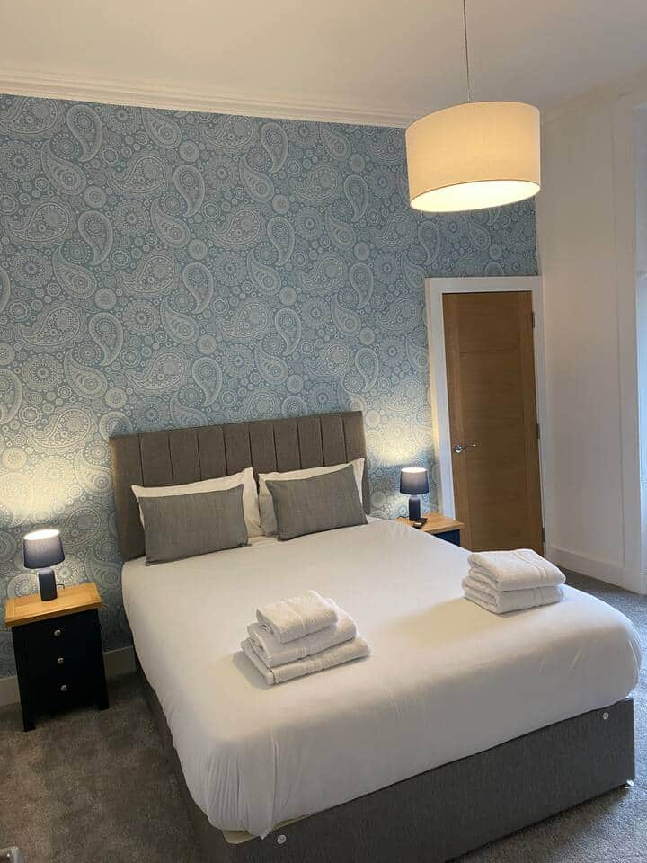 Spacious modern sleeps 5 above live music pub logo